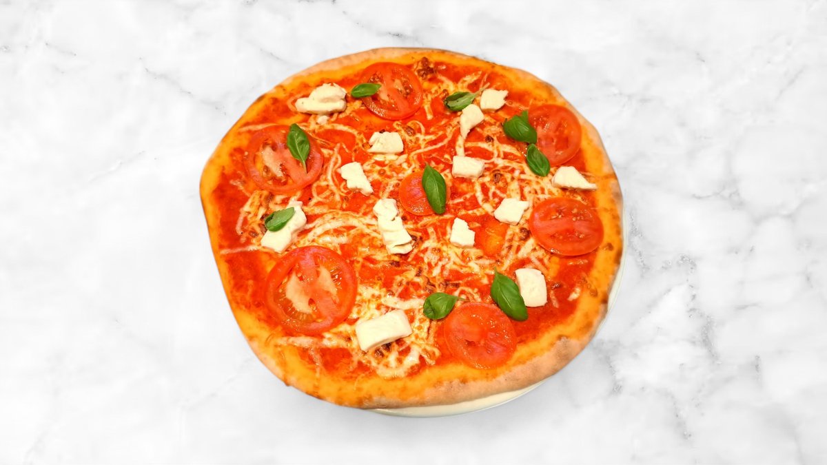 Pizza Caprese – Paradicsomszósz, mozzarella, paradicsom,bazsalikom.