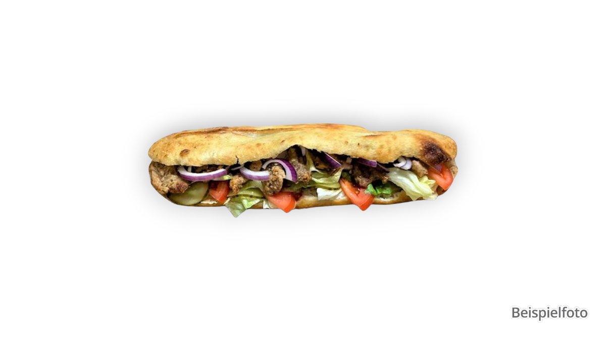 23. Baguette Döner – with onions, fresh tomatoes, lettuce and a type of meat of y...