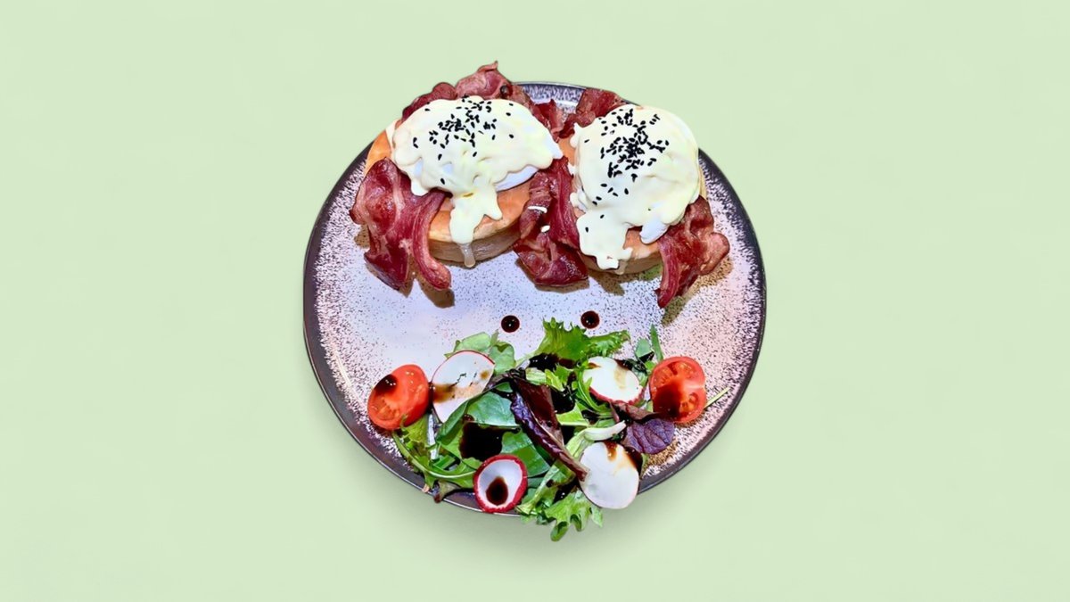 Eggs Benedict with Beef Bacon – 2 poached eggs on brioche bread, 3 beef bacon, salad and hol...