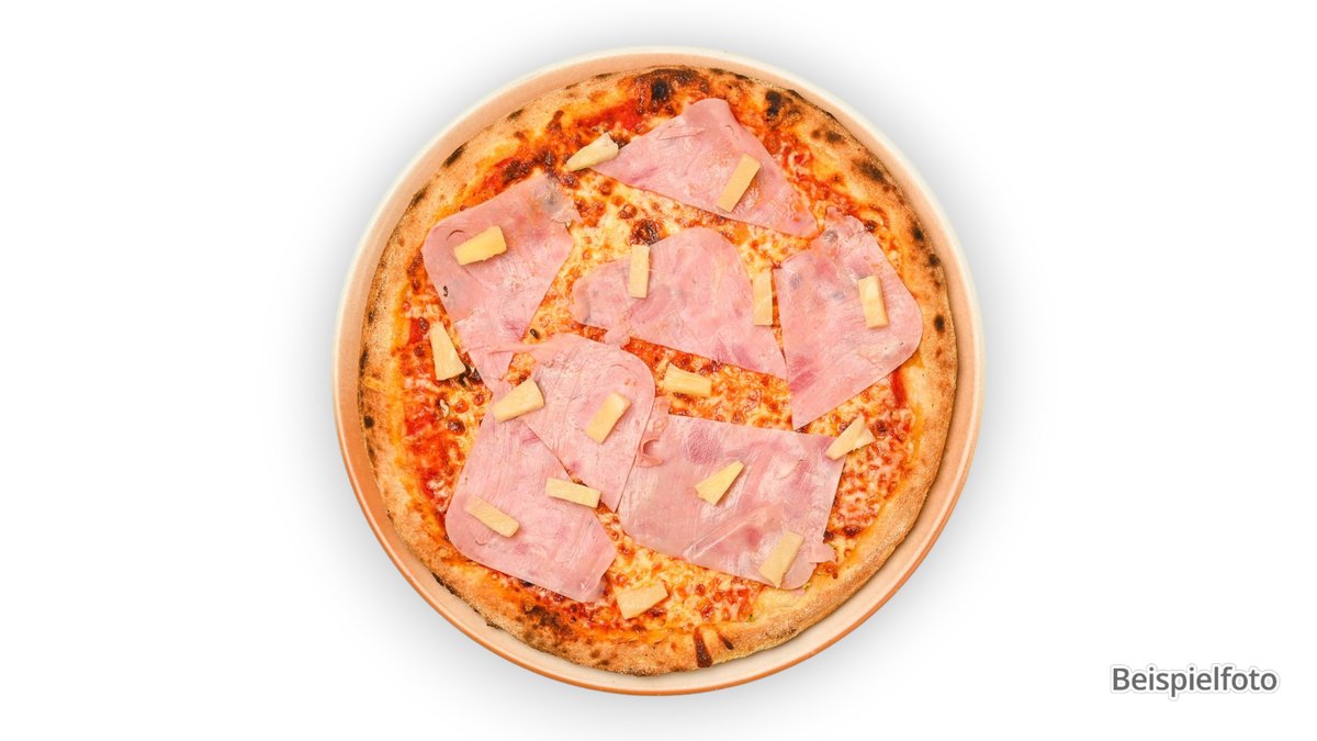Pizza Hawaii – with formed pork ham, assembled from meat cuts and pineapple