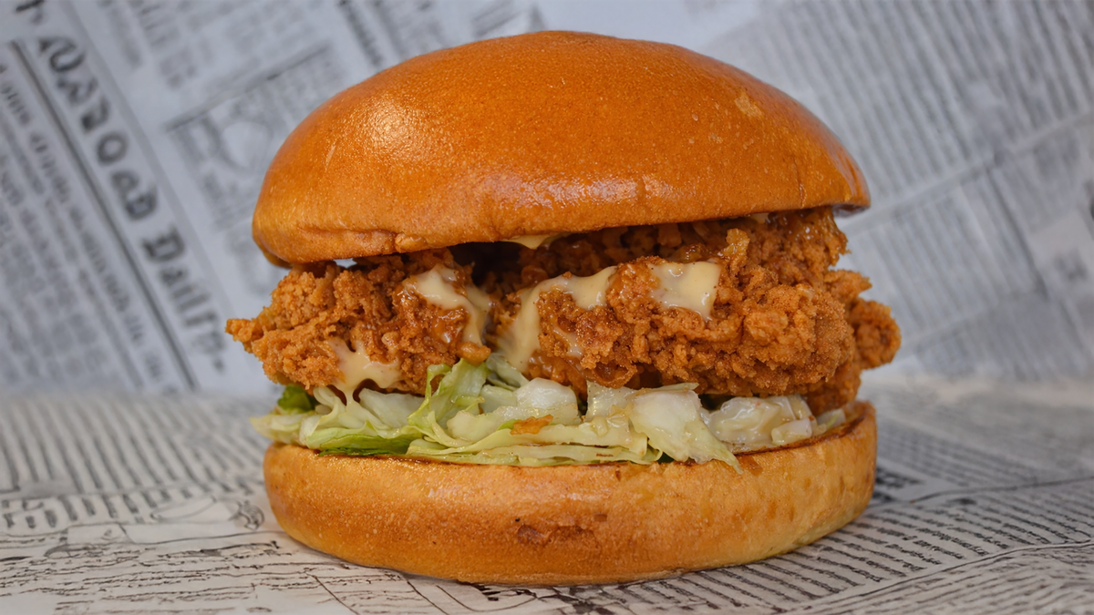 The Classic – Mango buns, Boneless Chicken Fillet, and lettuce. Sauce of c...